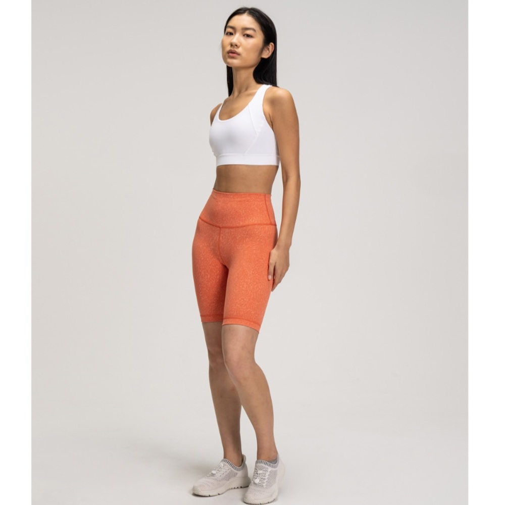 Lululemon coral Orange wunder train biker shorts high rise size 2